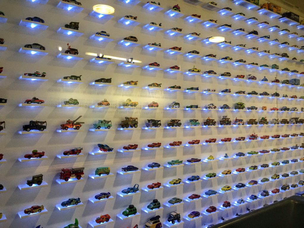 A whole wall of die-cast models from Disney/Pixar's Cars movies, at Walt Disney Studios.
